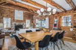 Formal dining area has seating for 8 and direct access to the back covered porch with BBQ grill